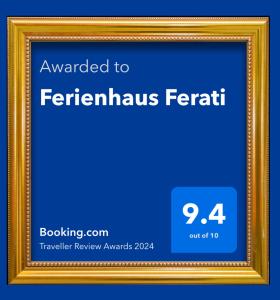 a gold picture frame with the text awarded to featherfamous benefit at Ferienhaus Ferati in Günzburg