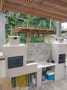 Η κουζίνα ή μικρή κουζίνα στο Juquehy Casa Condomínio