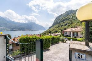 a view of a lake from a house at [ONNO] Il balcone vista lago - vicino a Bellagio in Onno