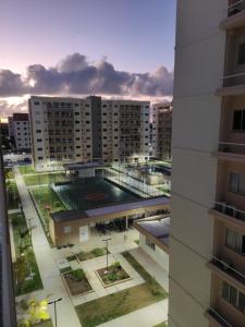 a view of a building from the window of a building at Aruana Azul 502 in Aracaju