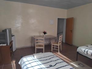 Ένα ή περισσότερα κρεβάτια σε δωμάτιο στο Doppelbett Zimmer mit WC