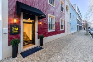 モンチジョにある2M BOUTIQUE HOTELの赤レンガ造りの建物