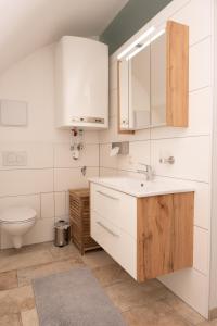 Koupelna v ubytování Bürgerhaus Martinecz + 33 fotografií