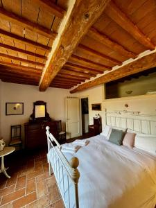 Voodi või voodid majutusasutuse Santa Monaca Medieval House toas