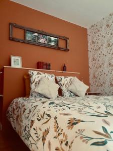 a bedroom with a bed and a window at Chambres d'Hôtes du Domaine de Bourbacoup in Tulle