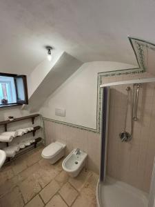 Koupelna v ubytování Mare Diem + 8 fotografií