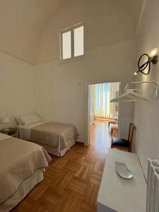 Postel nebo postele na pokoji v ubytování Mare Diem