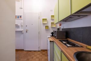 a kitchen with a sink and a counter top at Charming suite with view in the heart of Rome in Rome