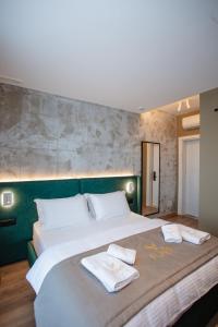 Uma cama ou camas num quarto em Hotel Flaer