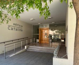 a building with a staircase leading to the front door at Cuyen 1 Pleno Centro in Santa Rosa