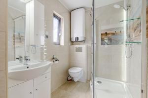 Et badeværelse på Domki letniskowe Agata + 15 billeder