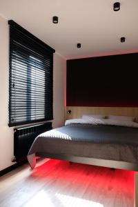 Llit o llits en una habitació de Rose Valley Apartment