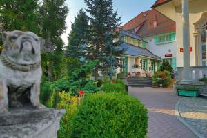 Vonkajšia záhrada v ubytovaní Hotel Garden