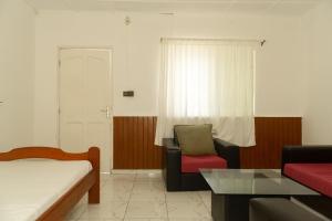 Postel nebo postele na pokoji v ubytování Tahiti Hotel