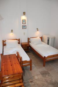 Postel nebo postele na pokoji v ubytování Cohyli Hotel