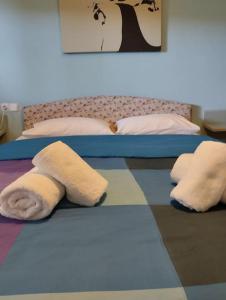 Postel nebo postele na pokoji v ubytování V&S Apartments