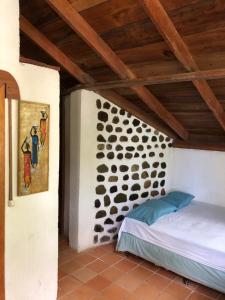 Voodi või voodid majutusasutuse Jungle River Lodge toas