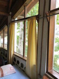 Voodi või voodid majutusasutuse Jungle River Lodge toas