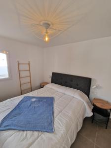 Hoy Caleta Apartments客房内的一张或多张床位