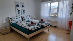 Postel nebo postele na pokoji v ubytování Apartment Cindy