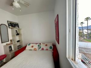 Postel nebo postele na pokoji v ubytování Apartamento frente al Mar