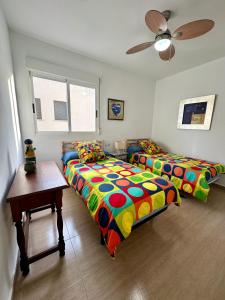Postel nebo postele na pokoji v ubytování Apartamento frente al Mar
