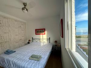 Postel nebo postele na pokoji v ubytování Apartamento frente al Mar