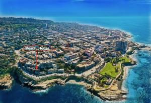 an aerial view of a resort near the ocean at La Jolla Cove-Oceanfront 5600SF 3BR+Loft 5BA House best Villiage location walk everywhere in San Diego