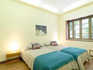 A bed or beds in a room at FLH Boavista House of Music with Private Garden