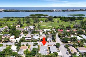 an aerial view of a resort with a red arrow at Sabal Palm Vacation Homes in Lake Worth