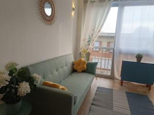 Posezení v ubytování Appartement aux Portes de Paris, métro 12