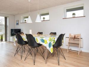 a dining room with a table and chairs at 6 person holiday home in Toftlund-By Traum in Toftlund