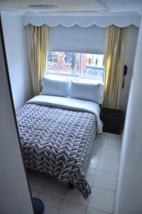Postel nebo postele na pokoji v ubytování La Gran Fortaleza B&B