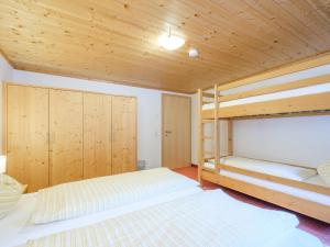 Postel nebo postele na pokoji v ubytování Chalet Peter