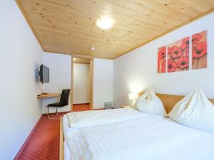 Postel nebo postele na pokoji v ubytování Chalet Peter