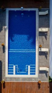 an overhead view of a large swimming pool at Villa Alexandre Pousada - Trancoso in Trancoso