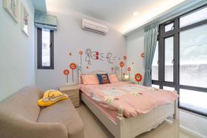 Letto o letti in una camera di 享樂民宿 可包棟