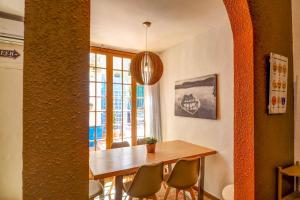 A seating area at Charming Patio by Hello Homes Sitges