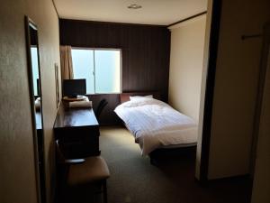 Postel nebo postele na pokoji v ubytování Business Hotel Nishiwaki - Vacation STAY 79029v
