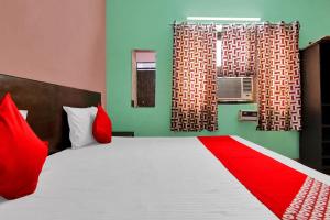 Cama o camas de una habitación en OYO Flagship 81167 Hotel Swagat Dx