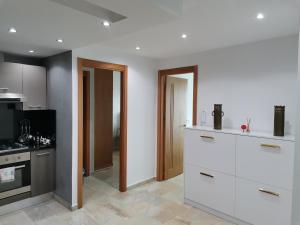 AppartF3 vue panoramique sur mer Residence Vista Del Mar 주방 또는 간이 주방