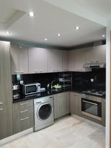 AppartF3 vue panoramique sur mer Residence Vista Del Mar 주방 또는 간이 주방