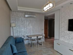 AppartF3 vue panoramique sur mer Residence Vista Del Mar TV 또는 엔터테인먼트 센터