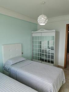 AppartF3 vue panoramique sur mer Residence Vista Del Mar 객실 침대