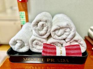 a box of towels sitting on a table at Prada motel in Geoje 