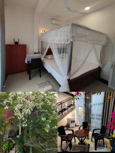 a bedroom with a canopy bed and a table and chairs at Flower Shade Villa in Weligama