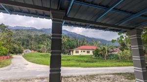 a view from the porch of a house at Homestay Dipang in Jeram