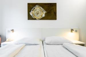 Postel nebo postele na pokoji v ubytování Hotel SKI