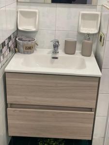a bathroom sink with two urinals on top of it at Ninni’& Nanna’ in Cetara +59 photos