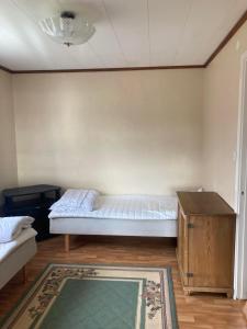 Un pat sau paturi într-o cameră la Solvillan